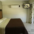 La imagen 11 de la Empresa HOTEL FLORES Transportes y Turismo en Guamúchil SIN