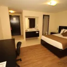 La imagen 6 de la Empresa HOTEL JOY SUITES Transportes y Turismo en Irapuato GUA